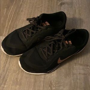 black nike with rose gold swoosh